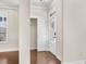 Bright entryway featuring hardwood floors, closet, and a glass-paneled front door at 4343 Ainsley Mill Ln, Duluth, GA 30097