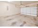 Empty garage with concrete floor and white garage door, ready for storage at 4343 Ainsley Mill Ln, Duluth, GA 30097
