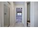 Bathroom showing shower stall and toilet room in the background with bedroom view at 5221 Huntcrest Sw Pl, Mableton, GA 30126