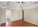 Spacious bedroom featuring trey ceiling and door to attached bath at 1000 Brushystone Dr, Loganville, GA 30052