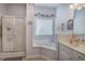 Bright bathroom with tub-shower combination, and vanity at 192 Adelaide Xing, Acworth, GA 30101