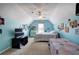 Bright blue bedroom with vaulted ceiling and two beds at 192 Adelaide Xing, Acworth, GA 30101