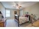 Cozy bedroom featuring a ceiling fan and a neutral color scheme at 192 Adelaide Xing, Acworth, GA 30101