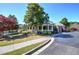 Community clubhouse featuring lush landscaping and ample parking at 192 Adelaide Xing, Acworth, GA 30101