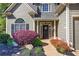 Charming home with a well-manicured lawn and inviting front entrance at 192 Adelaide Xing, Acworth, GA 30101