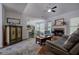 Spacious living room with vaulted ceiling, brick fireplace, and hardwood flooring at 192 Adelaide Xing, Acworth, GA 30101