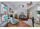 Spacious living room with high ceilings, hardwood floors, and a cozy fireplace at 192 Adelaide Xing, Acworth, GA 30101