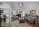 Bright, airy living room featuring a fireplace, hardwood floors, and vaulted ceiling at 192 Adelaide Xing, Acworth, GA 30101