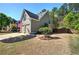 Lovely two-story home with a manicured lawn and an attached two-car garage at 192 Adelaide Xing, Acworth, GA 30101