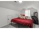Cozy bedroom with sloped ceilings and natural light at 220 Rocky Point Rd, Covington, GA 30014