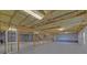 View of an unfinished basement with studded walls and insulation at 2800 Araglin Dr, Dacula, GA 30019