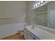 Bathroom with a large mirror and single sink vanity at 2800 Araglin Dr, Dacula, GA 30019