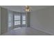 Spacious bedroom featuring a ceiling fan and a bay window for lots of natural light at 2800 Araglin Dr, Dacula, GA 30019