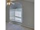 Bedroom with a ceiling fan and an arched window at 2800 Araglin Dr, Dacula, GA 30019