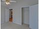 Bright bedroom includes an open closet system at 2800 Araglin Dr, Dacula, GA 30019
