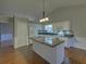 Well-equipped kitchen boasting an island, granite countertops, and ample cabinet space at 2800 Araglin Dr, Dacula, GA 30019