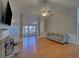 Cozy living room featuring a fireplace, hardwood flooring, and modern decor at 2800 Araglin Dr, Dacula, GA 30019