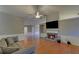 The open floorplan features hardwood flooring, a fireplace, and neutral paint at 2800 Araglin Dr, Dacula, GA 30019