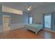 Main bedroom with vaulted ceilings and natural light from large windows at 2800 Araglin Dr, Dacula, GA 30019