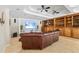 Finished basement area features a large screen TV and custom built-ins for storage at 345 Etheridge Rd, Auburn, GA 30011