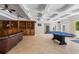 Basement featuring coffered ceilings, entertainment area, and ample space at 345 Etheridge Rd, Auburn, GA 30011