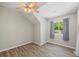 Bright bedroom with a ceiling fan, window and closet space at 345 Etheridge Rd, Auburn, GA 30011