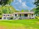 Charming home with well-manicured lawn and a two-car garage at 345 Etheridge Rd, Auburn, GA 30011
