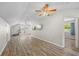 Spacious living room with hardwood floors, recessed lighting, and plenty of natural light at 345 Etheridge Rd, Auburn, GA 30011