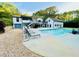 Backyard pool with lounge chairs and a view of the multi-level deck at 345 Etheridge Rd, Auburn, GA 30011