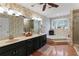 A primary bathroom with dual sinks, soaking tub, and walk-in shower at 3521 Jefferson Township Pkwy, Marietta, GA 30066