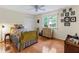 Cozy bedroom with hardwood floors and closet, perfect for rest and relaxation at 3521 Jefferson Township Pkwy, Marietta, GA 30066