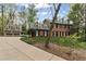 Brick home with an elongated driveway leading up to the house and a detached garage at 3521 Jefferson Township Pkwy, Marietta, GA 30066