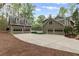 Three car detached garage with concrete parking pad at 3521 Jefferson Township Pkwy, Marietta, GA 30066