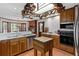 Kitchen area with hardwood floors, stainless steel appliances and decorative copper pots at 3521 Jefferson Township Pkwy, Marietta, GA 30066