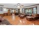 A large living room with a bay window offering natural light, featuring hardwood floors and traditional design elements at 3521 Jefferson Township Pkwy, Marietta, GA 30066