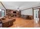 Spacious living room with hardwood floors, brick fireplace and built-in bookcases, perfect for relaxing and entertaining at 3521 Jefferson Township Pkwy, Marietta, GA 30066