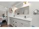 Bright bathroom with a double sink vanity, and a large mirror, perfect for a refreshing start to your day at 4213 Schooner Ne Ct, Roswell, GA 30075