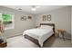 Well-lit bedroom showcasing a comfortable bed and a relaxing atmosphere at 4213 Schooner Ne Ct, Roswell, GA 30075