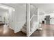 Inviting entryway with stairs and hardwood floors at 4213 Schooner Ne Ct, Roswell, GA 30075