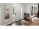 Bright entryway featuring hardwood floors and a decorative mirror at 4213 Schooner Ne Ct, Roswell, GA 30075
