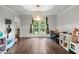 Well-lit playroom with hardwood floors, large windows, and play furniture at 4213 Schooner Ne Ct, Roswell, GA 30075