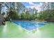 Well-maintained tennis court providing an excellent recreational amenity for residents at 4213 Schooner Ne Ct, Roswell, GA 30075