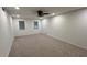 Spacious bedroom featuring neutral carpeting and a ceiling fan with light fixture at 7260 Dunhill Ter, Atlanta, GA 30328
