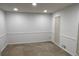 This bedroom has neutral-colored walls, trim, and carpet that is ready for your personal touches at 7260 Dunhill Ter, Atlanta, GA 30328