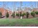 Newly landscaped backyard featuring a lush, green lawn and fresh mulch at 2340 Ellis Mountain Dr, Marietta, GA 30064