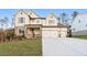 Charming two-story home featuring a three-car garage and stone accents at 2340 Ellis Mountain Dr, Marietta, GA 30064