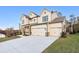 Beautiful home with a three car garage and a large concrete driveway at 2340 Ellis Mountain Dr, Marietta, GA 30064