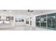 Open-concept space with modern kitchen, dining area with windows, and sliding doors to back deck at 2340 Ellis Mountain Dr, Marietta, GA 30064