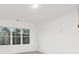 Bright living room with large window allowing for natural light and providing a view of the trees at 2340 Ellis Mountain Dr, Marietta, GA 30064