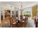 Formal dining room with a chandelier, large windows, and elegant decor at 3562 Langley Oaks Se Ct, Marietta, GA 30067